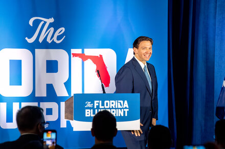 The governor has flip-flopped on one highly inconsequential matter: how to pronounce his name.