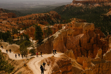Floods, landslides and fires are making it harder to get national parks ready for summer.