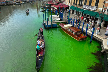 A chemical used in underwater construction and medical procedures was used to dye parts of the channel bright green, but the authorities still don’t know how it got there.