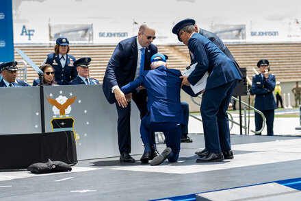 The president was helped up and walked back to his seat after delivering a speech and handing out diplomas to graduates in Colorado Springs.